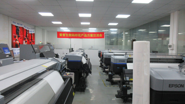 Large-format textile printers in a printing workshop
