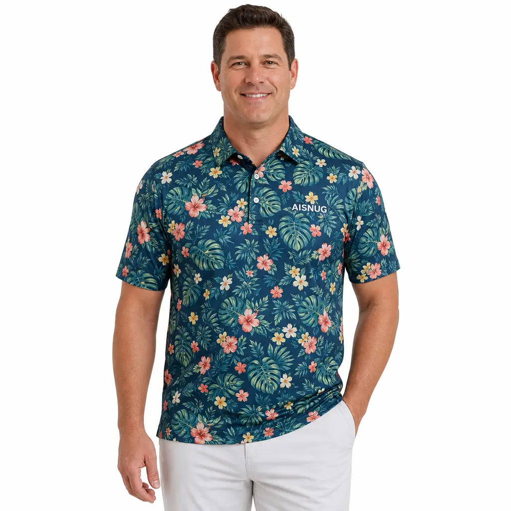 A dark blue short-sleeve polo with small pink and yellow flowers among green tropical foliage