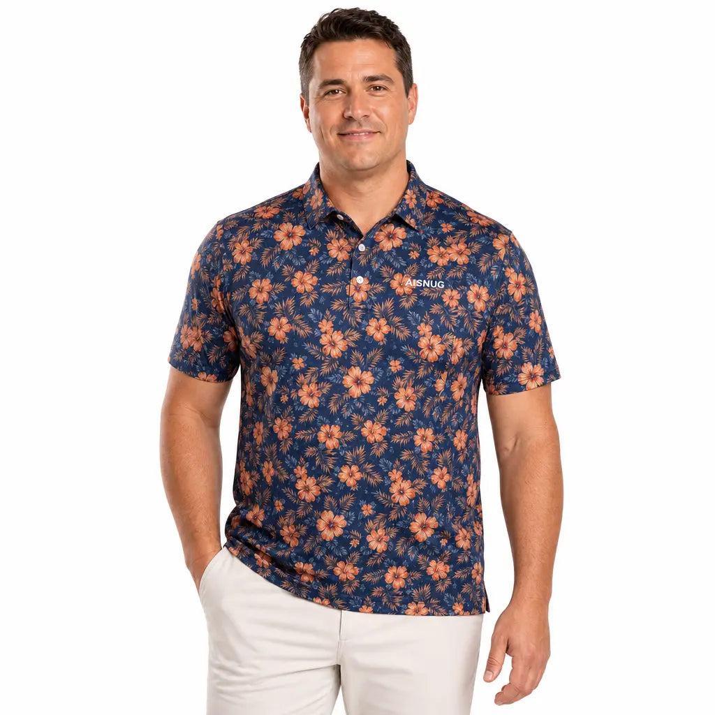 Orange hibiscus flowers and blue foliage repeat across a navy short-sleeve polo